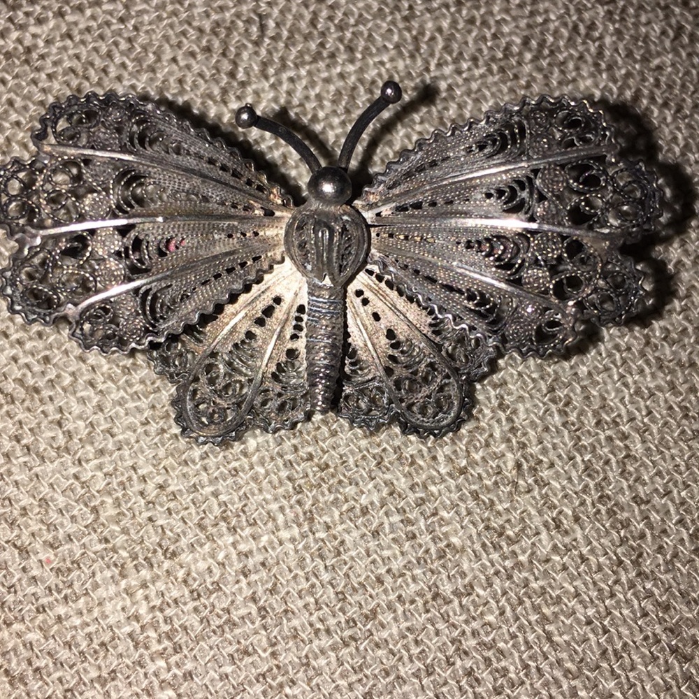 Silver filigree butterfly brooch
